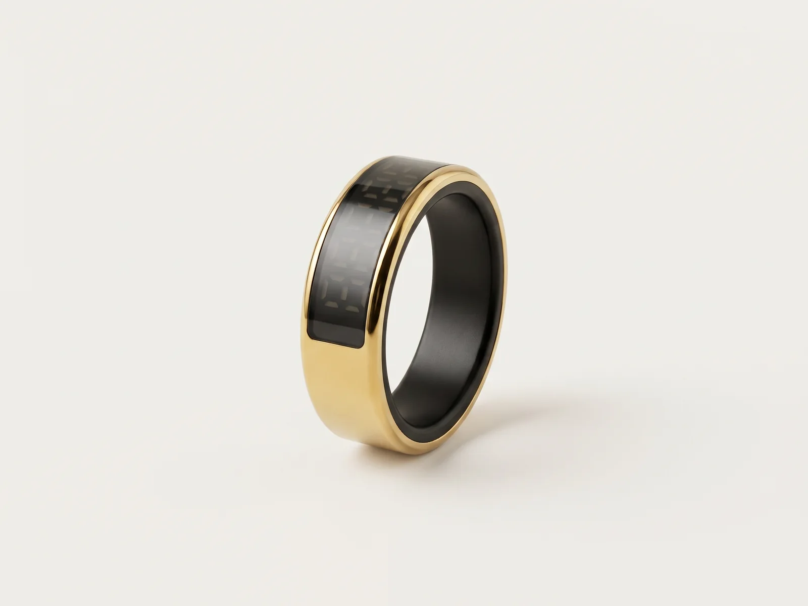 Product render of a gold smart ring with a dark segment-display window on its outer face